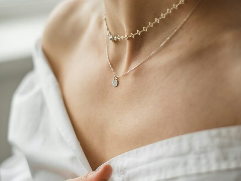 Layered waterproof necklaces worn on the collarbone